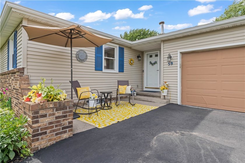 Updated 3 bedroom and 1.5 bath ranch offering the ease and - photo 4