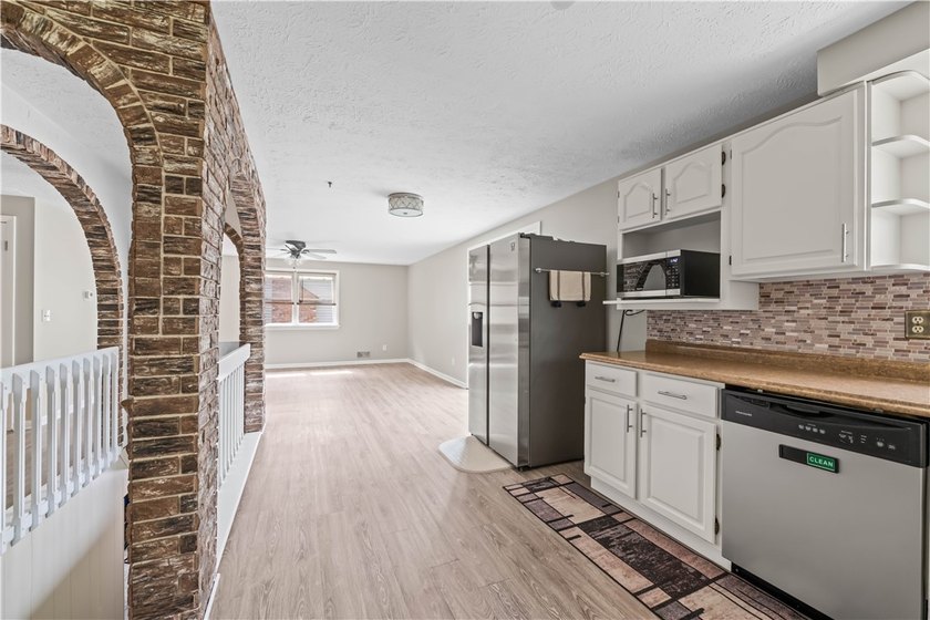 Updated 3 bedroom and 1.5 bath ranch offering the ease and - photo 8