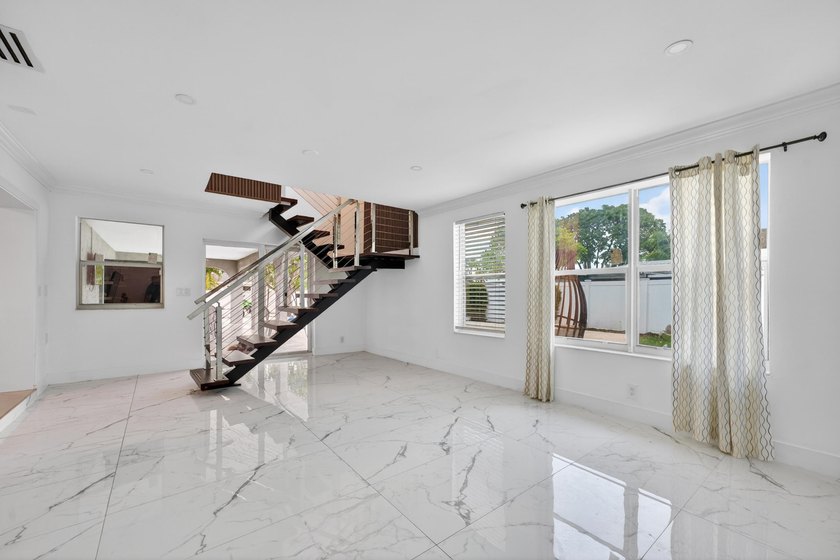 Stunning &amp; fully expanded two-story pool home in the heart of - photo 21
