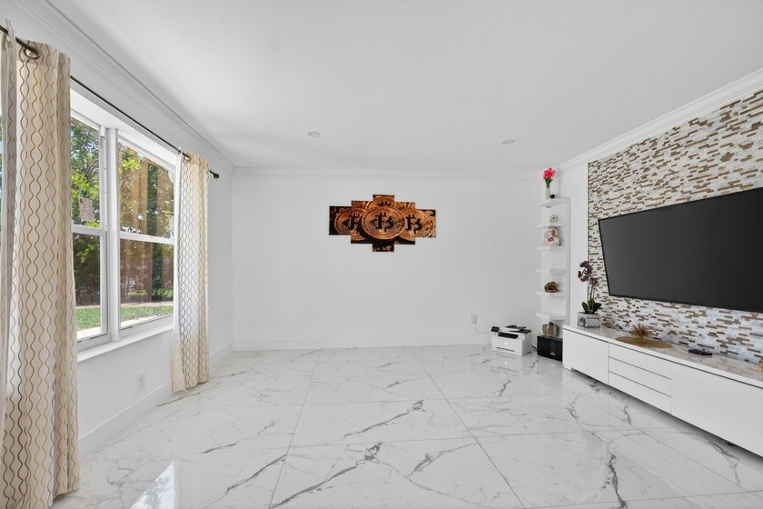 Stunning &amp; fully expanded two-story pool home in the heart of - photo 23