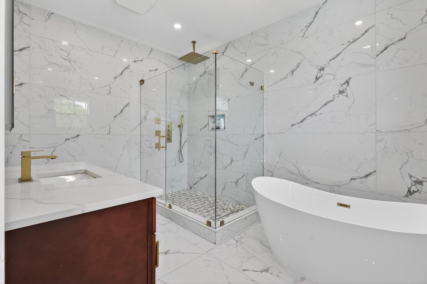Stunning &amp; fully expanded two-story pool home in the heart of - photo 24