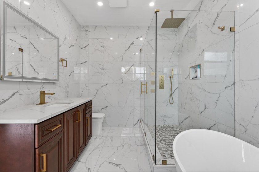 Stunning &amp; fully expanded two-story pool home in the heart of - photo 26