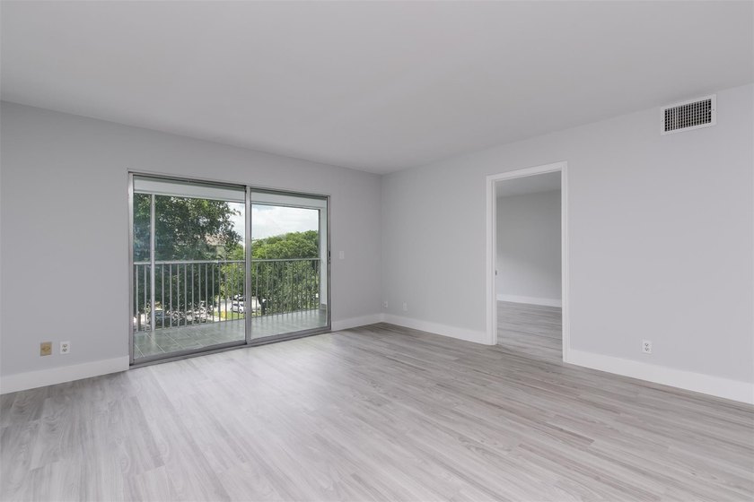 Updated 2 bedroom, 2 bath condo in Century Village in excellent - photo 11