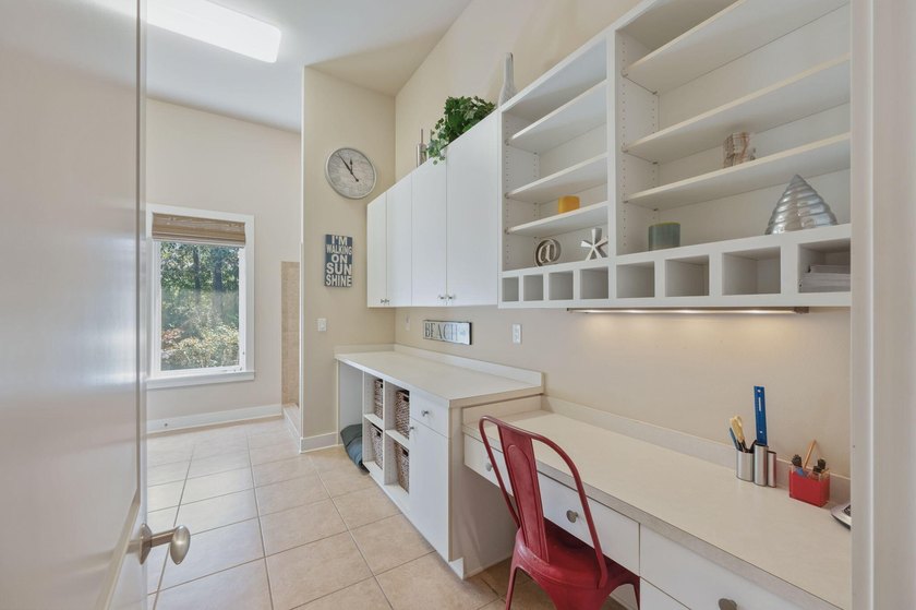 Experience refined coastal luxury in this exceptional 4-bedroom - photo 27
