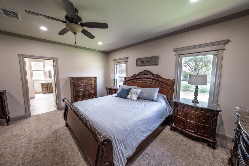 Experience luxury acreage living in Highland Oaks! Situated on a - photo 21