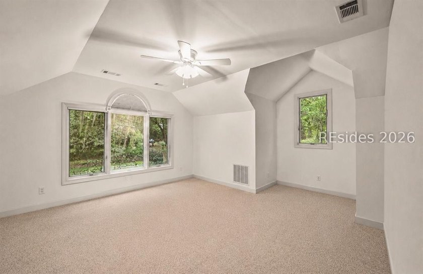 Nestled on a private circle within the prestigious Callawassie - photo 35