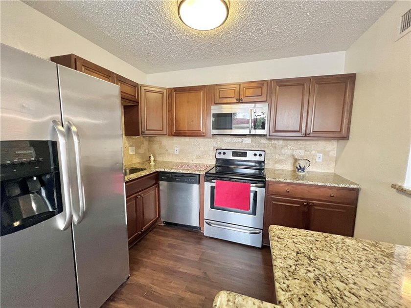 Enjoy coastal living at its best in this bright and inviting - photo 11