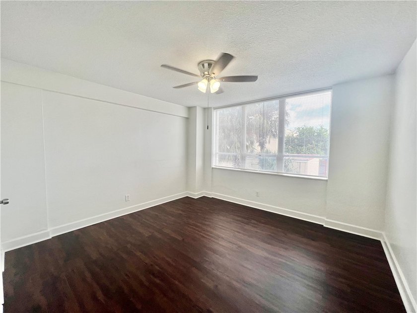 Enjoy coastal living at its best in this bright and inviting - photo 17