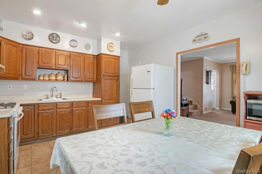 This well-maintained brick home offers a spacious and functional - photo 8