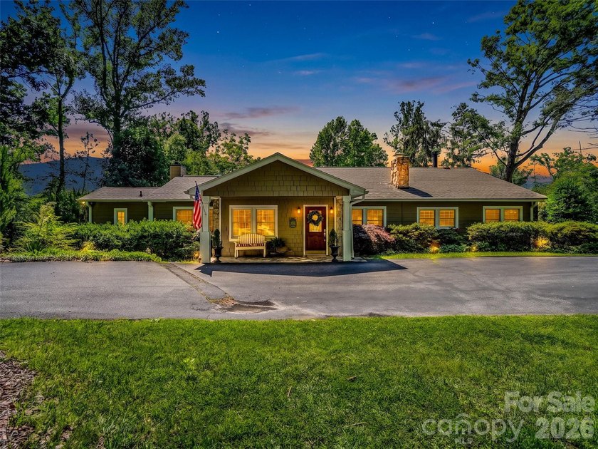 Discover unparalleled single-level living and privacy in the - photo 2