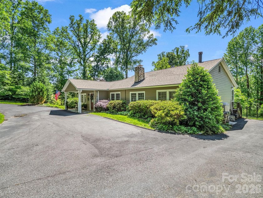Discover unparalleled single-level living and privacy in the - photo 4