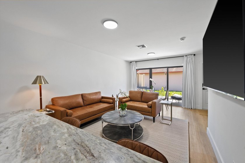 Turnkey furnished fourplex on the 12th Fairway! Four identical - photo 17