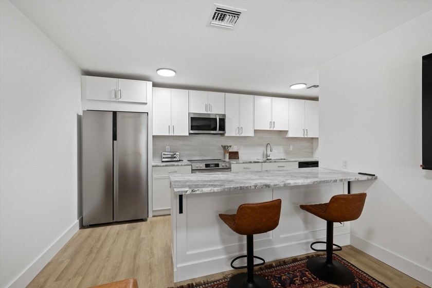 Turnkey furnished fourplex on the 12th Fairway! Four identical - photo 39