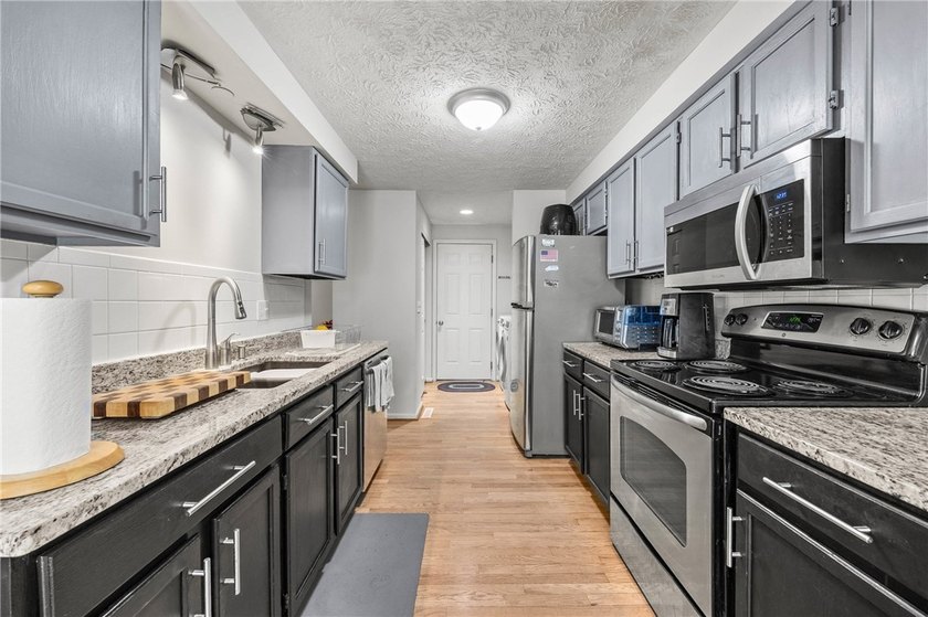 Welcome to this beautifully maintained townhome, which offers - photo 11