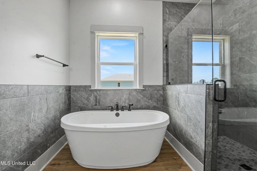 This beautiful Coastal Home offers a timeless blend of Charm and - photo 15