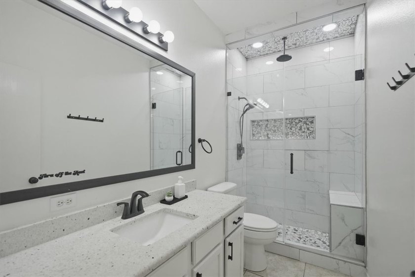 NEWLY renovated four-bedroom,two-bathroom split-plan home with - photo 17