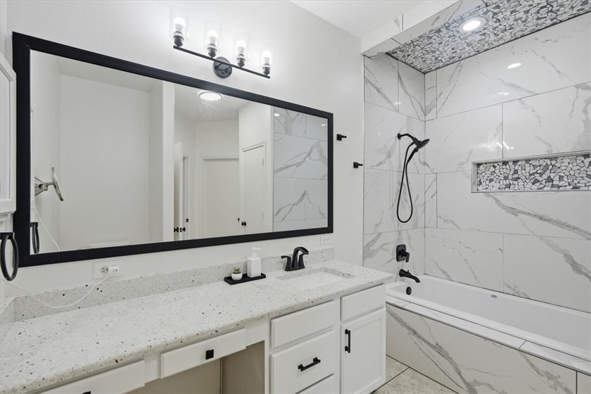 NEWLY renovated four-bedroom,two-bathroom split-plan home with - photo 22