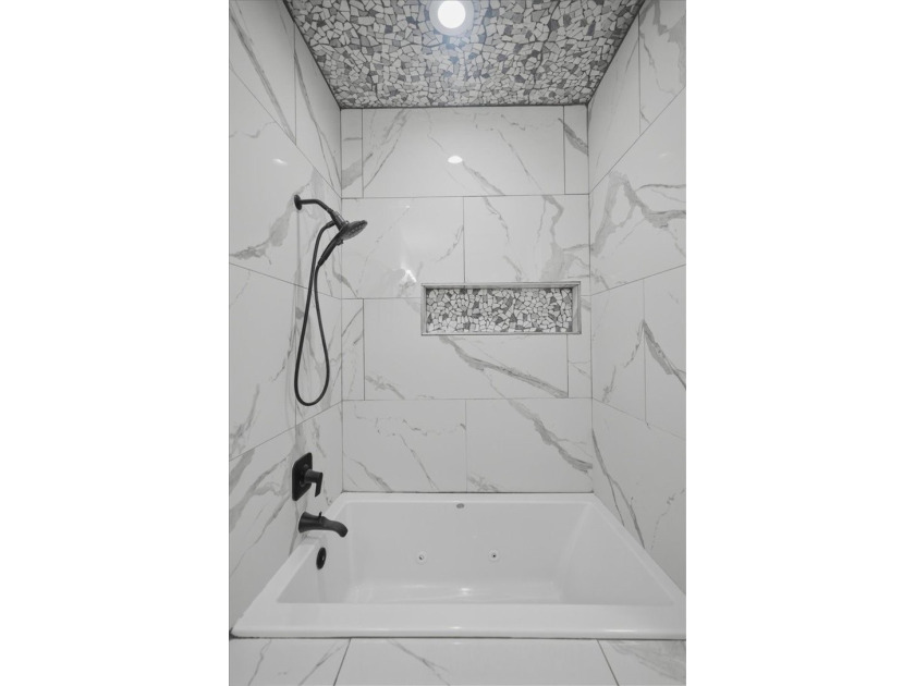 NEWLY renovated four-bedroom,two-bathroom split-plan home with - photo 25