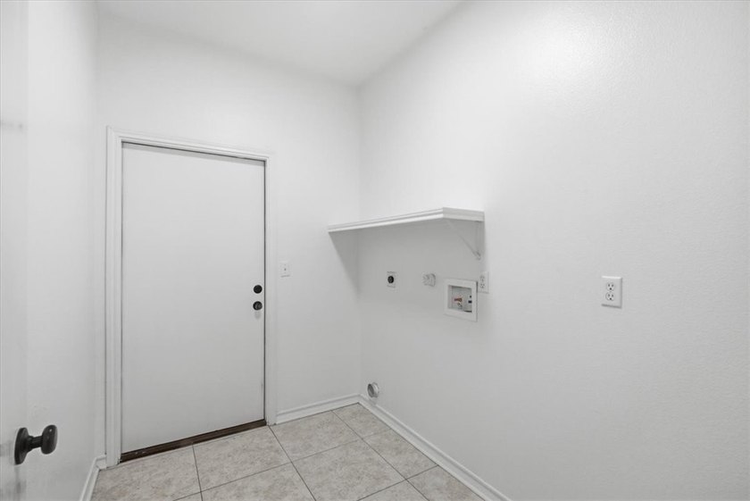 NEWLY renovated four-bedroom,two-bathroom split-plan home with - photo 26