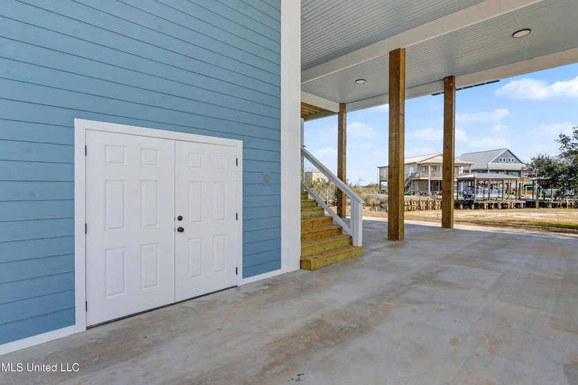 This beautiful Coastal Home offers a timeless blend of Charm and - photo 26
