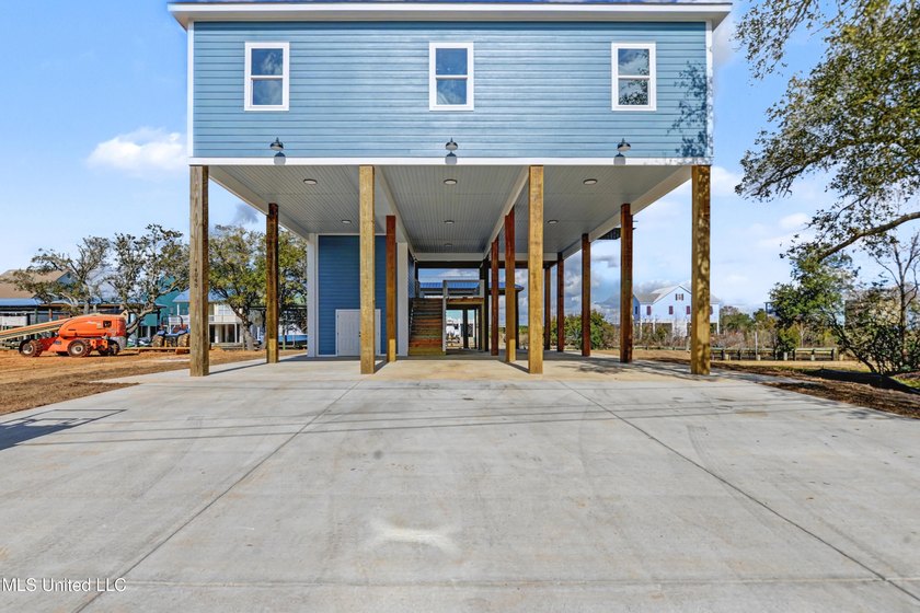 This beautiful Coastal Home offers a timeless blend of Charm and - photo 30