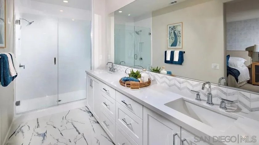 This spacious two-story paired home for residents ages 55 and - photo 12