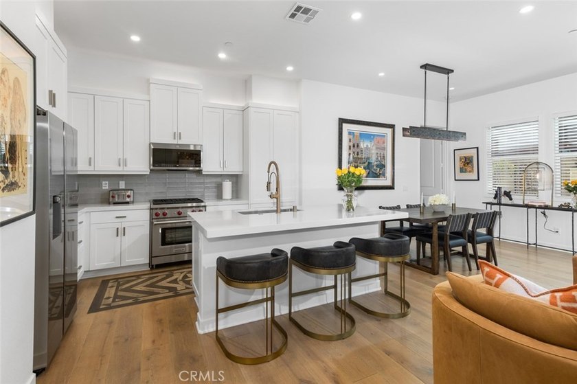 IRRESISTIBLE PRICE REDUCTION FOR A DESIGNER UPGRADED HOME! - photo 11