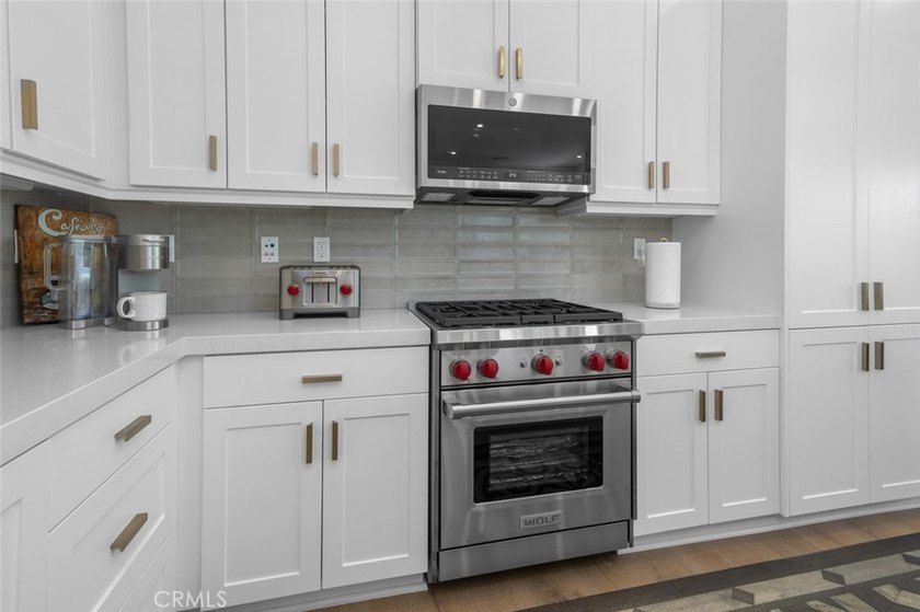 IRRESISTIBLE PRICE REDUCTION FOR A DESIGNER UPGRADED HOME! - photo 16