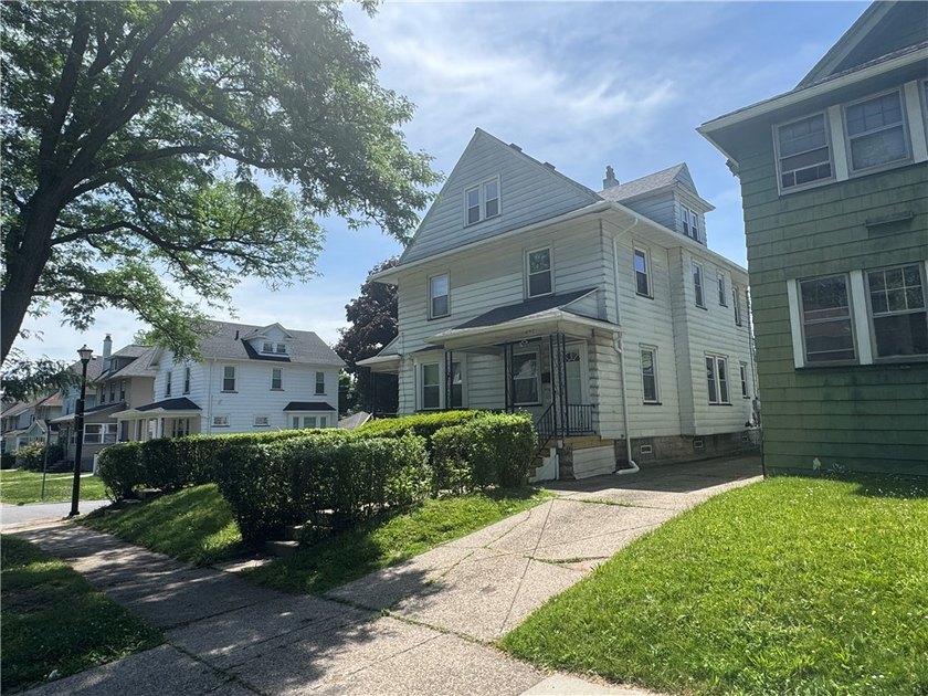 Located in the Maplewood Historic District! Add this duplex to - photo 6