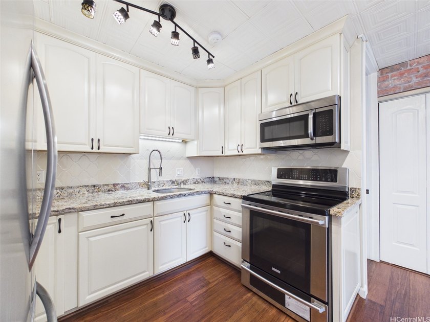 UPGRADED corner unit, lake-facing side, and an oversized covered - photo 12