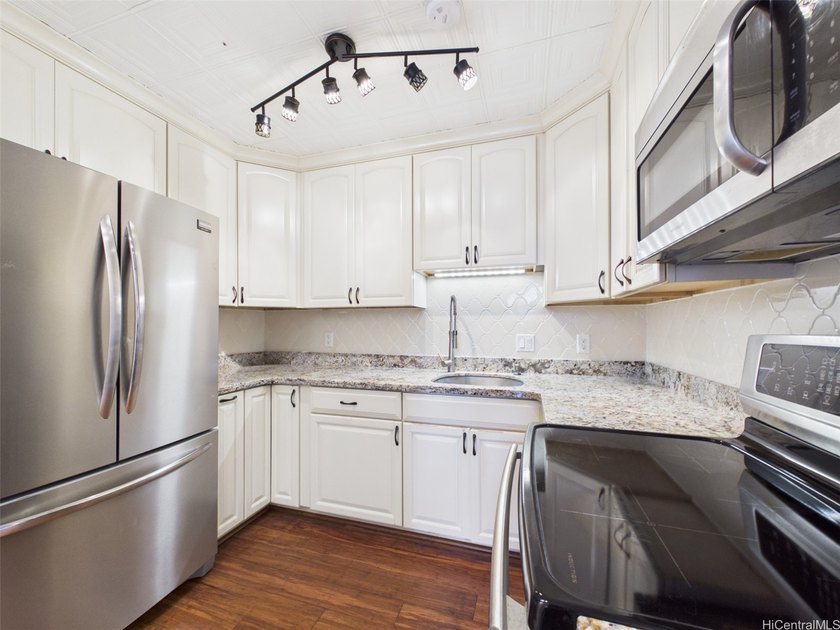 UPGRADED corner unit, lake-facing side, and an oversized covered - photo 13