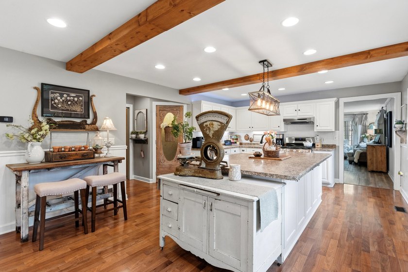 Set on nearly an acre in a close-knit lake community, this - photo 13