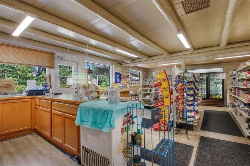 This *Vintage* Log Cabin Store sits between two premier lakes - - photo 6