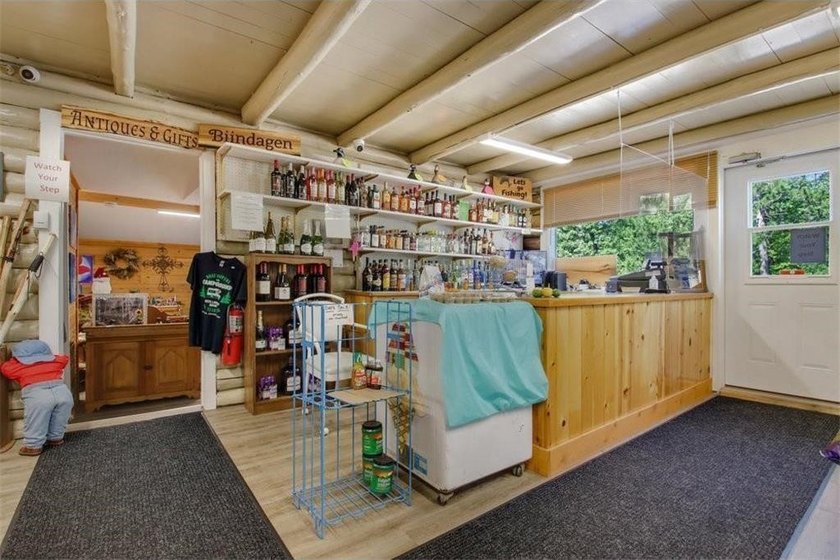 This *Vintage* Log Cabin Store sits between two premier lakes - - photo 8