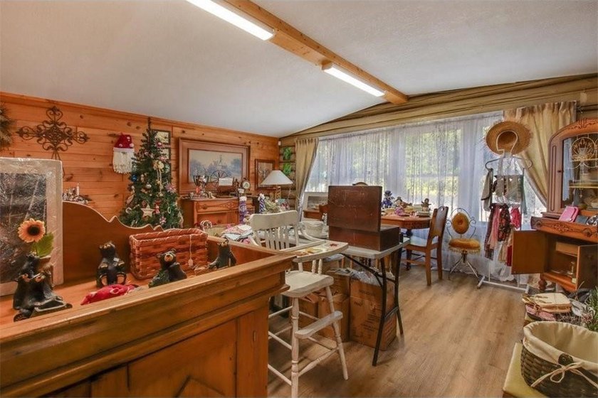 This *Vintage* Log Cabin Store sits between two premier lakes - - photo 9