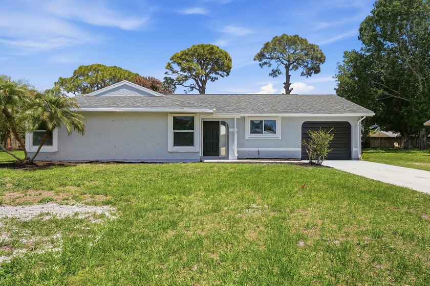 BRAND NEW ROOF, NEW A/C SYSTEM, FULLY RENOVATED .This - photo 25