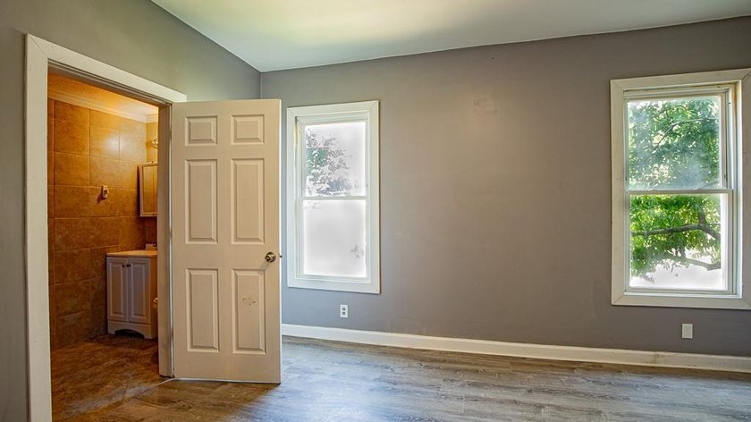 Adorable home with covered front porch. Large entry foyer for - photo 31