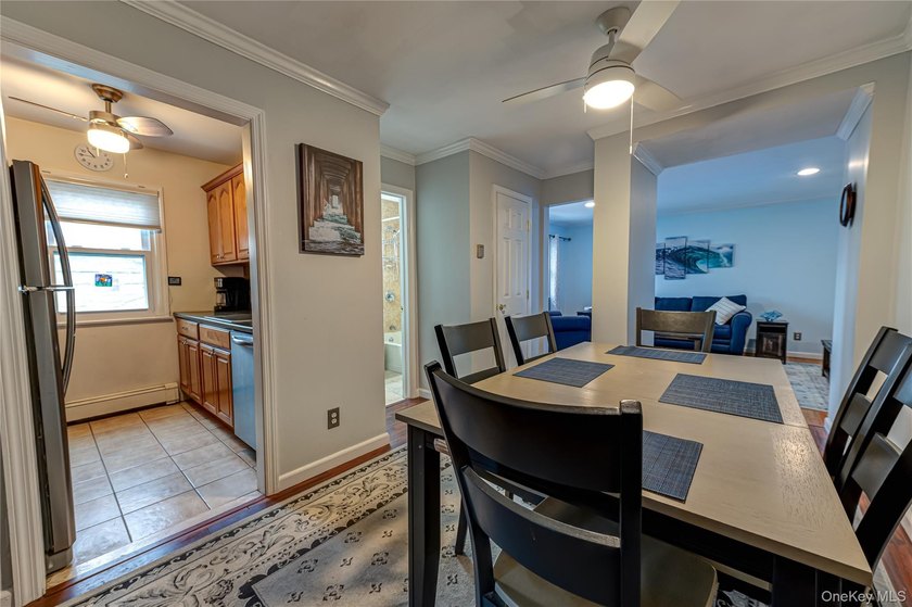 Customized second story corner unit in pristine condition - photo 4