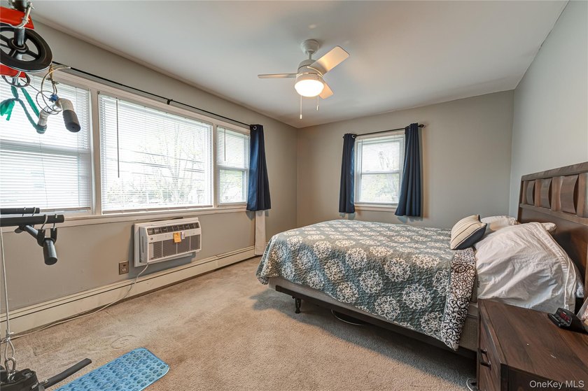 Customized second story corner unit in pristine condition - photo 6