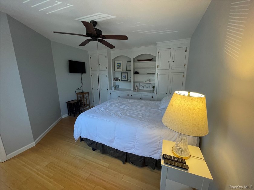 This inviting second-floor condo in Westhampton offers a - photo 9