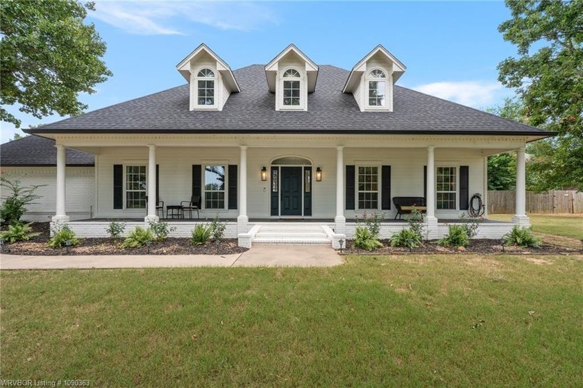 Timeless Southern elegance meets modern comfort in this - photo 2