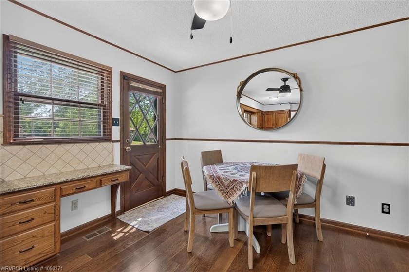 Welcome to this charming Tudor-style home in the Fianna Hills - photo 10