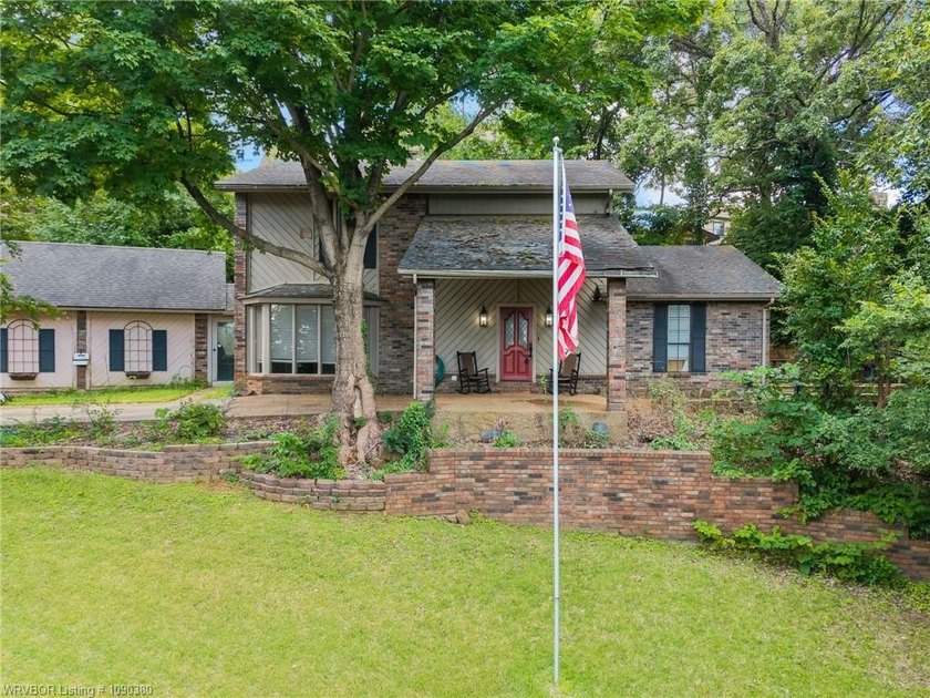 Perched on an elevated homesite in desirable south Fort Smith - photo 2