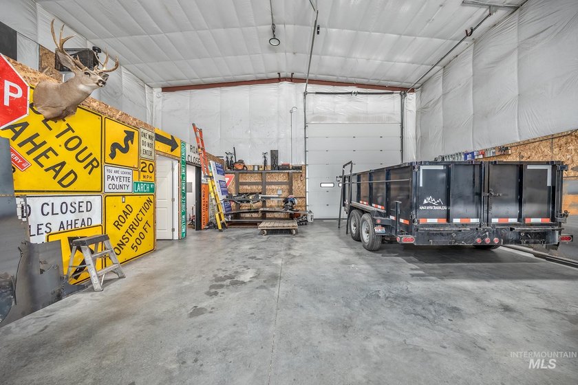 2400 sf shop with over-sized drive through bay doors. 18' eaves - photo 8