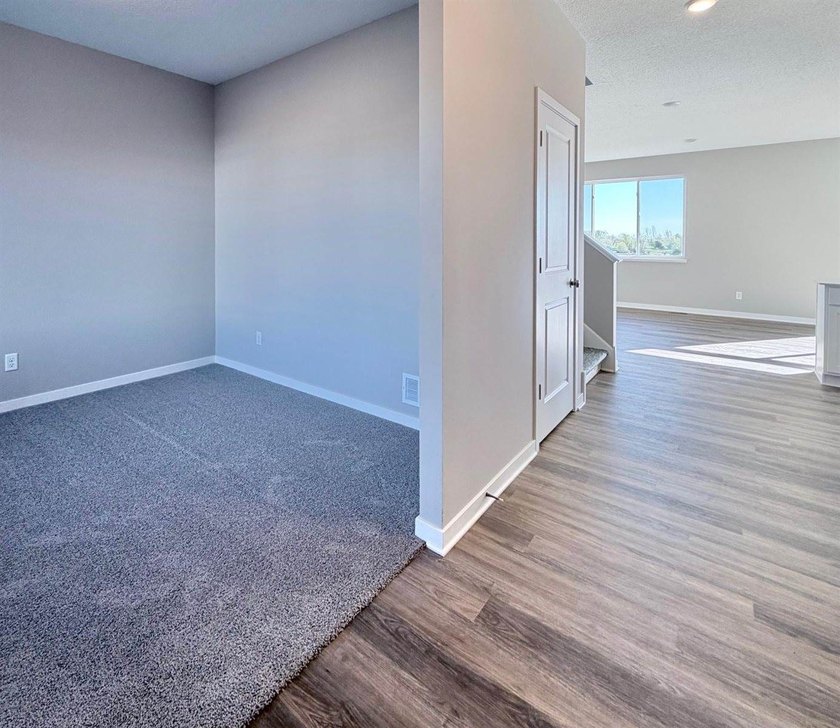 Highlights include a spacious 4 BAY GARAGE, Two Story modern - photo 8