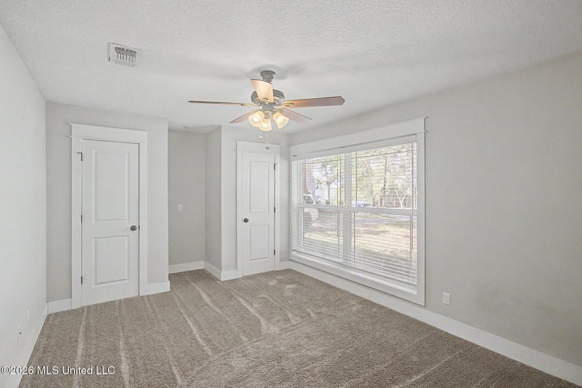 Tucked away on a quiet, tree-lined street, this beautifully - photo 24