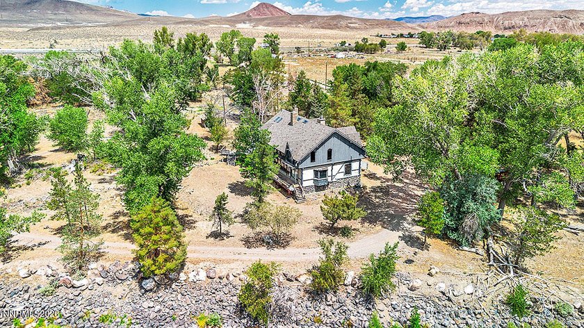 Discover a truly rare Nevada riverfront retreat - a majestic - photo 38