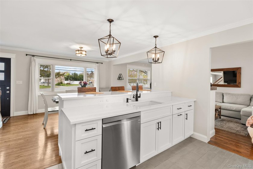 This beautifully renovated Colonial in East Islip sits on an - photo 6