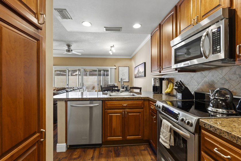 LOCATED IN THE COVETED TEQUESTA OAKS COMMUNITY, THIS 2 STORY - photo 15