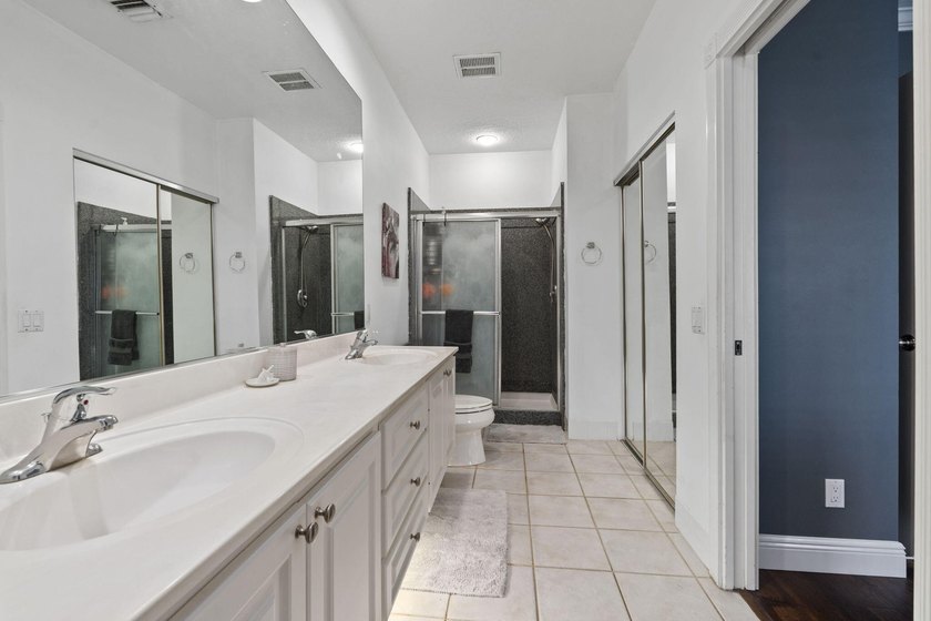 LOCATED IN THE COVETED TEQUESTA OAKS COMMUNITY, THIS 2 STORY - photo 28